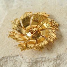 Illuminate your ensemble with a burst of elegance with our Vintage Fireworks Brooch. This exquisite brooch captures the spirit of celebratory fireworks in a vintage-inspired design, adding a touch of timeless charm to your style. Metal: 18ct Recycled Gold Plated On Brass Dimensions:5.5*5.5cm Weight: 29.5g Vintage Fireworks, Matching Suits, Three Dimensional Shapes, Medieval Style, Medieval Fashion, Gold Brooches, Copper Material, Tiger Eye Stone, Vintage Inspired Design