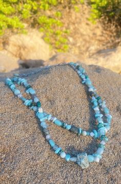 Larimar (also called the Ocean Stone) is a  rare stone mined in the Dominican Republic and is said to be a healing stone. I love pairing this with Turquoise and Aquamarine for a cool bright refreshing feeling and look.  I can make this necklace with or without a center stone so just let me know which you would like! I'm based out of SoCal and Idaho. I started making these for myself (then friends and family) because I couldn't find the quality and style that I personally wanted to wear. I love using gem stones because they bring a raw connection to earth unlike other jewelry. If you cant find what you're looking for describe the colors or stones you would like and I can make a new design for you! I love exploring new designs. Turquoise Blue Necklace With Natural Amazonite Stones, Bohemian Blue Amazonite Turquoise Necklace, Bohemian Amazonite Turquoise Necklace, Healing Turquoise Necklace With Amazonite Beads, Healing Blue Turquoise Necklace With Natural Stones, Turquoise Aquamarine Healing Necklace, Turquoise Choker, Larimar Jewelry, Rare Stone