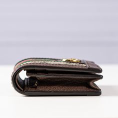 This Gucci Supreme GG Ophidia Card Case Wallet is crafted from brown and tan GG Supreme canvas with gold-tone hardware, leather trim and Web accent. Leather & nylon lining with card slots, open pocket and currency zipper pocket at interior with snap closure. Includes dust bag and box. Measuring: 4.5 in. L, 3.5 in. H, 1 in. D. Excellent condition: Card Case Wallet, Dior Shoes, Chanel Handbags, Leather Trim, Card Case, Leather Trims, Snap Closure, Card Slots, Zipper Pocket