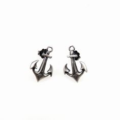 Silver earrings in the shape of small anchors on studs. Oxidized finish. Anchor dimensions 1.9 cm by 1.2 cm. 925 silver fineness. Small Anchor, Oct 11, Anchors, Jewelry Earrings Studs, Poland, Silver Earrings, 925 Silver, Jewelry Earrings, Accessory Gift