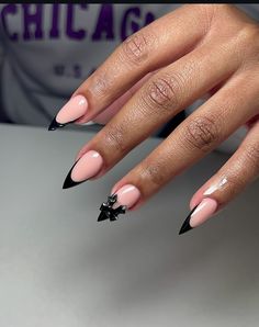 Black stilettos nails inspo Stilettos nails with bow charm inspo Black nail inspo Clean Black Nails, Stiletto Bow Nails, Alomd Nails Cute French, Stiletto Nails With Bows, Black Tips Almond Nails, Black Almond Nails French Tip, Short Stiletto French Tip Nails, Black Nails Acrylic Almond, Stiletto Nails With Charms