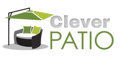 the clever logo for clever patio with an umbrella over it and pillows on the couch