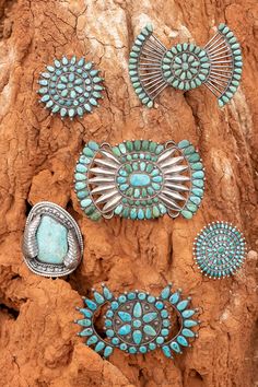 THIS TWO-IN-ONE STATEMENT PIECE MAKES A BIG IMPRESSION. The center stone is a large cabochon of beautiful Carlin turquoise with some light matrix, set in tiny serrated bezels and framed with twist wire, stamped silver drops, and two large applique leaves on each side. It’s equipped with a c-clasp pin to be worn as a brooch, but also a pendant loop if you want to slide this statement piece on your favorite silver chain or strand of beads. At almost 4” long, it’s impossible to ignore -- certainly Indian Arts And Crafts, Double D Ranch, Twisted Wire, Pin Pendant, Silver Bars, Family Heirloom, Vintage Pins, Native American Jewelry, Blue Turquoise