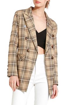 Amp up your work day style with this plaid double-breasted blazer featuring peaked lapels and flap pockets for a polished vibe. 28" length (size Small) Double-breasted button closure Peaked lapels Front flap pockets Lined 98% polyester, 2% elastane Dry clean Imported Chic Double-breasted Plaid Blazer, Trendy Beige Double-breasted Blazer, Spring Plaid Double-breasted Blazer, Double-breasted Plaid Blazer With Double Button Closure, Chic Plaid Blazer With Buttons, Plaid Double-breasted Office Blazer, Plaid Double-breasted Blazer For Office, Plaid Double-breasted Outerwear For Work, Chic Plaid Blazer With Lapel Collar