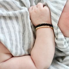 Gold Baby Bracelet (3MM beads) – gemsbylaura Everyday Hypoallergenic Gold Bracelet With Round Beads, Spiritual Stretch Bracelet With Tiny Beads As Gift, Dainty Stretch Bracelet With 8mm Beads, Yellow Gold Bracelets With 8mm Beads For Everyday, Adjustable Hypoallergenic Yellow Gold Stretch Bracelet, Adjustable Gold Bracelet With Round Beads For Everyday, Classic Adjustable Beaded Bracelets With Gold Beads, Adjustable Stackable Yellow Gold Beaded Bracelets, Adjustable Yellow Gold Stackable Beaded Bracelets