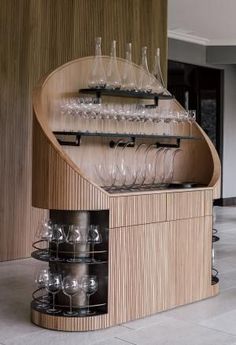 a wooden counter with wine glasses on it