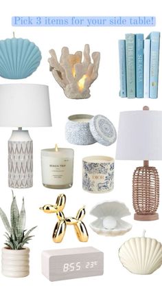 a bunch of items that include candles, books and other things to put on the table