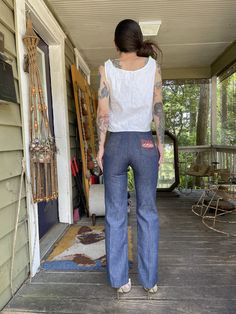 "How about a pizza dat a$$?? With these rare vintage indigo denim pizza pants! Big embroidered back pocket, straight leg fit, dark dark wash. In excellent condition with snap button and zipper closure. Waist: 26\" Hips: 33\" max, best for 32\" Rise: 11\" Inseam: 30\" Model is 5'7\" and 116 lbs with measurements of 30x24x34. These were slightly small in the hips." Embroidered Dark Wash Straight Leg Bottoms, Embroidered Straight Leg Dark Wash Bottoms, Retro Embroidered Denim Bottoms, Embroidered Dark Wash Cotton Bottoms, Dark Wash Embroidered Cotton Bottoms, Embroidered Dark Wash Mid-rise Bottoms, Embroidered Mid-rise Dark Wash Bottoms, Vintage Embroidered Denim Blue Bottoms, Fitted Dark Wash Embroidered Jeans