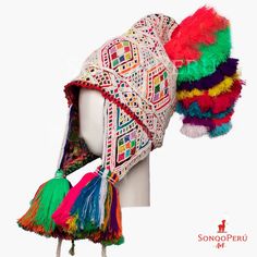 Beautiful Chullo Hat of the Q'ero Ceremony This is a chullo hat, hand woven and decorated with beads in the Andean Community of Q'eros in the province of Paucartambo. Q'eros communities still decorate their clothes with beads. This originated in the 17th century after the Incas were conquered by the Spaniards they practically became slaves and worked in the fields for the Spaniards called ascendants and as compensation they received products and one of them was beads, at that time they did not k Traditional White Hat For Festival, Traditional White Festival Hat, Traditional White Hat Bands For Festival, White Traditional Festival Hat, Traditional Handmade Adjustable Bonnet, Handmade Traditional Adjustable Bonnet, Handmade Adjustable Traditional Bonnet, Traditional Curved Brim Festival Hats And Headpieces, Traditional Handmade Multicolor Hat Bands