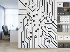 a computer circuit board wall decal in an office with bookshelves and filing cabinets