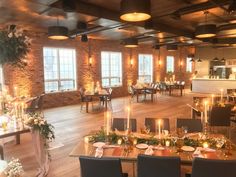 a large room with tables and chairs set up for an event