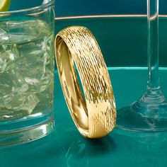 Ross-Simons - Italian 14kt Yellow Gold Bangle Bracelet. 8.5". Our splendid bangle bracelet is a must-have. Shining in textured and polished finishes of 14kt yellow gold, this Italian-crafted bangle bracelet truly works with any outfit. 3/4" wide. Slip-on, 14kt yellow gold bangle bracelet. Formal Yellow Gold Hammered Bangle, Yellow Gold Bracelet With Shiny Finish For Anniversary, Modern Yellow Gold Bangle For Anniversary, Hammered Yellow Gold Bangle For Anniversary, Modern Hammered Yellow Gold Bangle, Formal Textured Yellow Gold Jewelry, Modern Gold Bracelet With Diamond Cut For Anniversary, Modern Diamond Cut Gold Bracelet For Anniversary, Modern Yellow Gold Diamond Cut Bangle