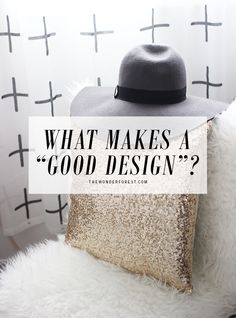 a hat sitting on top of a pillow next to a wall with the words what makes a good design?