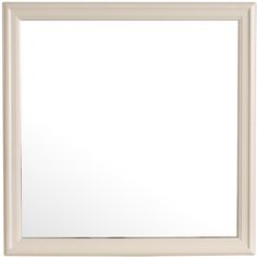 a white framed mirror on a wall