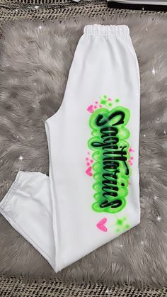 Designs by Galveston Airbrush! ♡ Feel free to contact me with any questions or custom orders. Each design includes up to TWO names or words with up to THREE specified COLORS. SIZES: Available for MEN and WOMEN DESIGN PLACEMENT: All designs are airbrushed on the FRONT of our sweatpants unless specified otherwise. Get more design ideas from our TikTok at @galvestonairbrush and Instagram at @Galveston_Airbrush. Follow your order process on our Insta Stories.  Sweatpants : 50% cotton, 50% polyester virtually pill-free; high-stitch density double-needle-covered elastic waistband and cuffs elastic bottom leg openings WASHING INSTRUCTIONS: º Wash it inside out in cold water º No bleach º Hang to dry º Ironed inside out if needed These personalized sweatpants would easily be the cutest part of any Cute Sweatpants, Custom Airbrushing, Unique Outfit, Womens Trousers, Women Design, Dance Team, Personalized Gifts For Kids, Dance Teams, Insta Stories