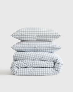 three pillows stacked on top of each other