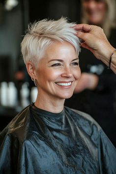 9. Edgy Platinum Pixie with Undercut for 60-Year-Olds (Pixie Hairstyles For Older Women) - Pixie Hairstyles For Older Women Undercut For Thick Hair, Pixie With Undercut, Pixie Hairstyles For Older Women, Platinum Pixie, Hairstyles For Older Women, Pixie Cut With Undercut, Short Hair Pixie Cuts, Pixie Haircut For Thick Hair