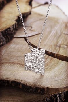 Are you looking for your other half? Look no further! A shiny rectangle cut in half. Unique worn alone, amazing worn with the other half! The choice is yours! https://www.etsy.com/listing/614681111/edgy-rectangle-pendant-small-reticulated?ref=shop_home_active_19 https://www.etsy.com/listing/614673859/black-silver-rectangle-pendant-small?ref=shop_home_active_22 PRODUCT DETAILS The pendant is 3.5cm x 2.4 (approx. 1.37in x 0.95in). Its surface has been specially treated to have a reticulated look. Silver Clay Jewellery Ideas, Silver Hammered Rectangular Pendant Jewelry, Hammered Sterling Silver Rectangular Pendant Jewelry, Sterling Silver Hammered Rectangular Pendant Jewelry, Hammered Sterling Silver Jewelry With Rectangular Pendant, Unique Silver Rectangular Necklace, Hammered Silver Rectangular Jewelry, Square Silver Sterling Silver Necklace, Rectangular Silver Hammered Jewelry