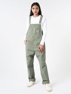 The Women’s Bib Overall Straight takes inspiration from utilitarian garments originally crafted for manual work, but is executed in a contemporary, refined cut. Constructed from a midweight cotton fabric and garment dyed for a more complex colour configuration. Adjustable shoulder straps Utility pockets at the logo patch Carpenter side pockets Button side closures Bartack stitching at vital stress points Materials Fabric Content: 100% cotton Size Guide Hara wears size S. She is 5'6.5"; bust 31"; waist 23"; hips 33.5" XS S M Waist 78 84 90 Front rise 24 25 27 Thigh 32 34 35 Inseam 78 78 78 Fits true to size. We recommend taking your normal size. For additional size information, please visit our size guide or contact Customer Service at mailorder@gravitypope.com Womens Work Overalls, Carhartt Overalls Women, Carhartt Overalls, Manual Work, Carhartt Work In Progress, Carhartt Women, Utility Pockets, Bib Overalls, Overalls Women