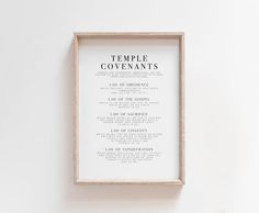 a framed poster on the wall that says temple covenants in black and white lettering