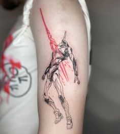 a person with a tattoo on their arm holding a red light saber and wearing a white t - shirt