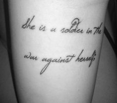 a tattoo saying she is a soldier in the air