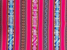 pink and blue striped fabric with different patterns