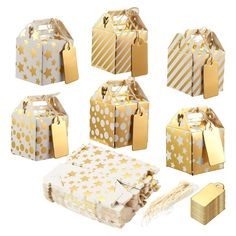 gold and white gift boxes with tags on them