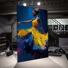 a painting of a woman in a yellow and blue dress is displayed on a table