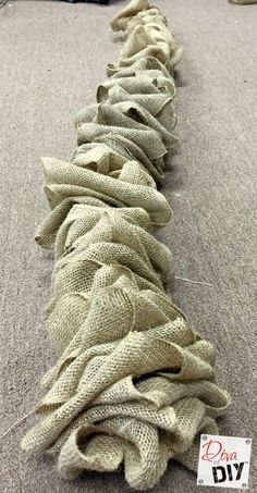 a pile of cloth sitting on top of a carpet