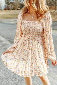 This boho mini-dress is more elegant and sweet than you might expect This Apricot Boho Floral Smocked Puff Sleeve Mini Dress is perfect for a chic, summery look. Featuring a square neckline, cute puff sleeves and smocked detailing, this dress is made from a lightweight and skin-friendly fabric for a comfortable feel. Add a bit of flair to any outfit with this must-have piece. We like its square neck, cute puff sleeves, smocked details, and skin-friendly fabric The floral print with the ruffled d Long Sleeve Smock Dress, Puff Sleeve Mini Dress, Balloon Sleeve Dress, Boho Mini Dress, Red Boho, Stunning Gowns, Smocked Dress, Floral Mini Dress