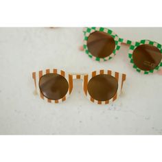 Striped Sunglasses for Babies + Kids - White/Brown Playful Orange Sunglasses For Beach, Green Sunglasses For Beach, Playful Orange Plastic Sunglasses, Adjustable Retro Sunglasses For The Beach, Cute White Plastic Sunglasses, White Fun Sunglasses For Summer, Fun White Sunglasses For Summer, Retro Pink Sunglasses For The Beach, Retro Pink Sunglasses For Beach