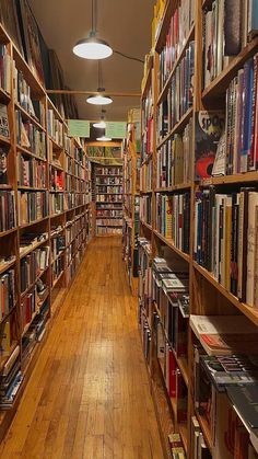 a long row of bookshelves filled with lots of books