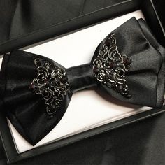 Black satin bow tie with adjustable strap. So amazing! Much better than a regular boring bow tie. Bow Tie Accessories, Rosary Style Necklace, Silver Mask, Fashion Models Men, White Bow Tie, Bridal Party Outfit, Black Licorice, Black Bow Tie, Photo Makeup