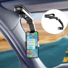 an image of a cell phone holder attached to the dashboard of a car with a road in the background