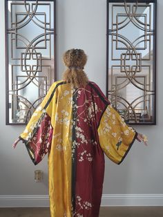 Kimono's add style to any look!  This is perfect to pair with a solid colored dress, jeans, or worn over your favorite bathing suit. It can be dressed up or down.  Light silk blend material - very light weight with wide bat wing sleeves  Model is 5'9" and wears a size medium top One size only - This kimono is oversized by design to allow a flowy and comfortable fit, which adds both style and appeal to your look. Tall girl and plus size friendly  **NEW DEAL** Purchase 2 items or more and get 10% Yellow Kimono, Bat Wing Sleeves, Wing Sleeves, Light Silk, Dress Jeans, Down Light, Bat Wing, Tall Girl, Golden Yellow