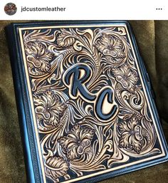 an old book with the letter r on it