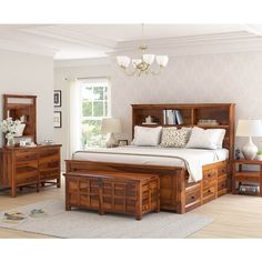 a bedroom scene with focus on the bed and dresser