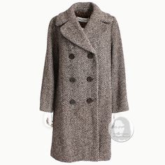 Here's a chic wool coat from Dolce & Gabbana, most likely made in the 2000s. Made from a soft brown and cream white herringbone wool, it features double-breasted construction, side pockets, chunky buttons and is fully-lined in satin leopard print fabric.    Perfect for the upcoming fall and winter months! The wide collar can be turned up, and the classic cut is perfect for wear over a sweater.    Made in Italy. 100% wool, dry clean only. Tagged size 40. Approximate measurements, taken flat and d Dolce Gabbana Jacket, Coat Classic, Leopard Print Fabric, White Herringbone, Vintage Coats, Black Wool Coat, Herringbone Tweed, Boucle Jacket, Maxi Coat