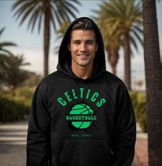 Boston Celtics Vintage Unisex Heavy Blend™ Hooded Sweatshirt, Boston celtics hoody sweat shirt, celtics vintage hoody sweats, Celtics gear. This unisex heavy blend hooded sweatshirt is relaxation itself. Made with a thick blend of cotton and polyester, it feels plush, soft and warm, a perfect choice for any cold day. In the front, the spacious kangaroo pocket adds daily practicality while the hood's drawstring is the same color as the base sweater for extra style points. .: Made with a medium-he Hooded Sports Fan Hoodie For Streetwear, Green Fan Apparel Hoodie For Streetwear, Collegiate Green Hoodie For Streetwear, Vintage Boston, Vintage Hoodie, Boston Celtics, The Pouch, Cold Day, Hooded Sweatshirt