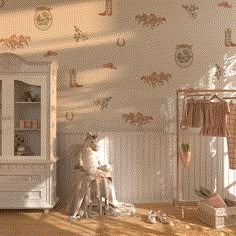 a child's room with an animal themed wallpaper