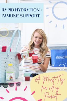 a woman is holding a cup and smiling