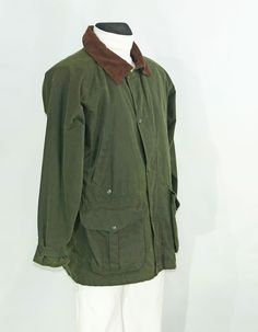 Vintage Country wear waxed Cotton tank .Dark Green  windbreaker Parka Jacket by Montgomery,   marked Size M for outdoor. waterside. gardening. fishing. rainy weather, storm jacket great condition.  by Original Montgomery ,  style Men's tank shell 100% wax coated cotton  ,inner 65% polyester 35% viscose 4 outside pockets . 1 inside pocket zip closure The actual measurement ( laying flat) as follows; Chest (arm Pit to armpit) 60 cm - 23,5 in Collar to hem                  80см- 31,5 in Shoulder to Green Windbreaker, Weather Storm, Country Wear, Rainy Weather, Vintage Country, Parka Jacket, Waxed Cotton, Parka, Dark Green