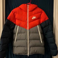 Red,Grey, And Blue Nike Men's Goose Down Puff Coat. Size Medium. Coat Was Worn One Time. Bought One Year Ago, Never Washed. Medium Coat, Mens Winter Coat, One Year Ago, Blue Nike, Red And Grey, Men Winter, Winter Coat, Nike Jacket, Nike Men