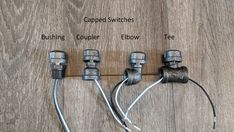 four different types of wires connected to each other on a wooden floor with words describing the three electrical components