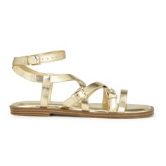 Dress to impress in the Nine West Rulen flat sandal. The Rulen features a modern square toe, adjustable ankle strap and strappy design to make this flat sandal, chic and detailed. Gold T-strap Sandals With Flat Heel For Summer, Cheap Gold T-strap Sandals For Summer, Gold T-strap Flat Sandals For Summer, Adjustable Gold T-strap Sandals, Gold Leather T-strap Sandals With Adjustable Fit, Strappy Sandals Flat, Travel Shoes, Strappy Sandals, Gladiator Sandals