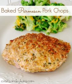 baked parmesan pork chops on a plate with broccoli