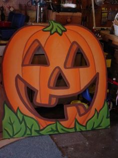 a large carved pumpkin sitting on top of a table