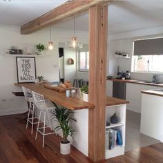 the kitchen is clean and ready to be used as a dining room or living room