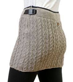 This soft hand-knit New Zealand wool miniskirt sports a classic cable-knit design, and is fleece lined for ultimate comfort. The wool fabric is the perfect weight for spring, summer and fall, and can even be worn with tights for the winter months. Find out for yourself why this classic skirt is so popular! Knit Skirts, Classic Skirts, Winter Months, Knit Skirt, Soft Hands, Soft Hand, Wool Fabric, Winter Wear, Knitting Designs